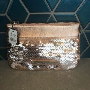 Small rose gold clutch